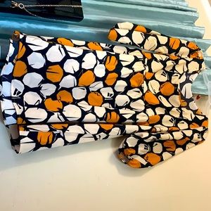 Geometric. Black, white and orange dress